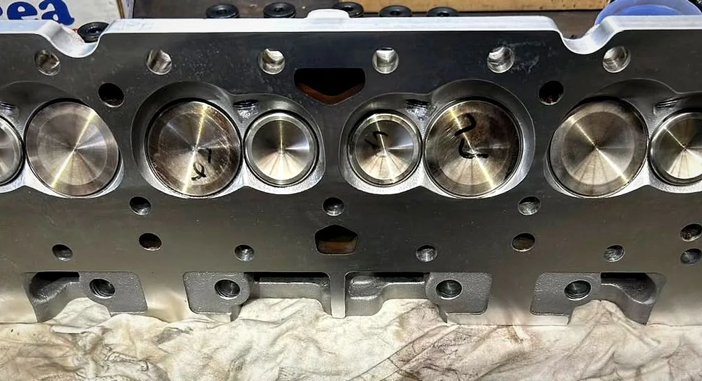 Freshly machined cylinder head with polished combustion chambers