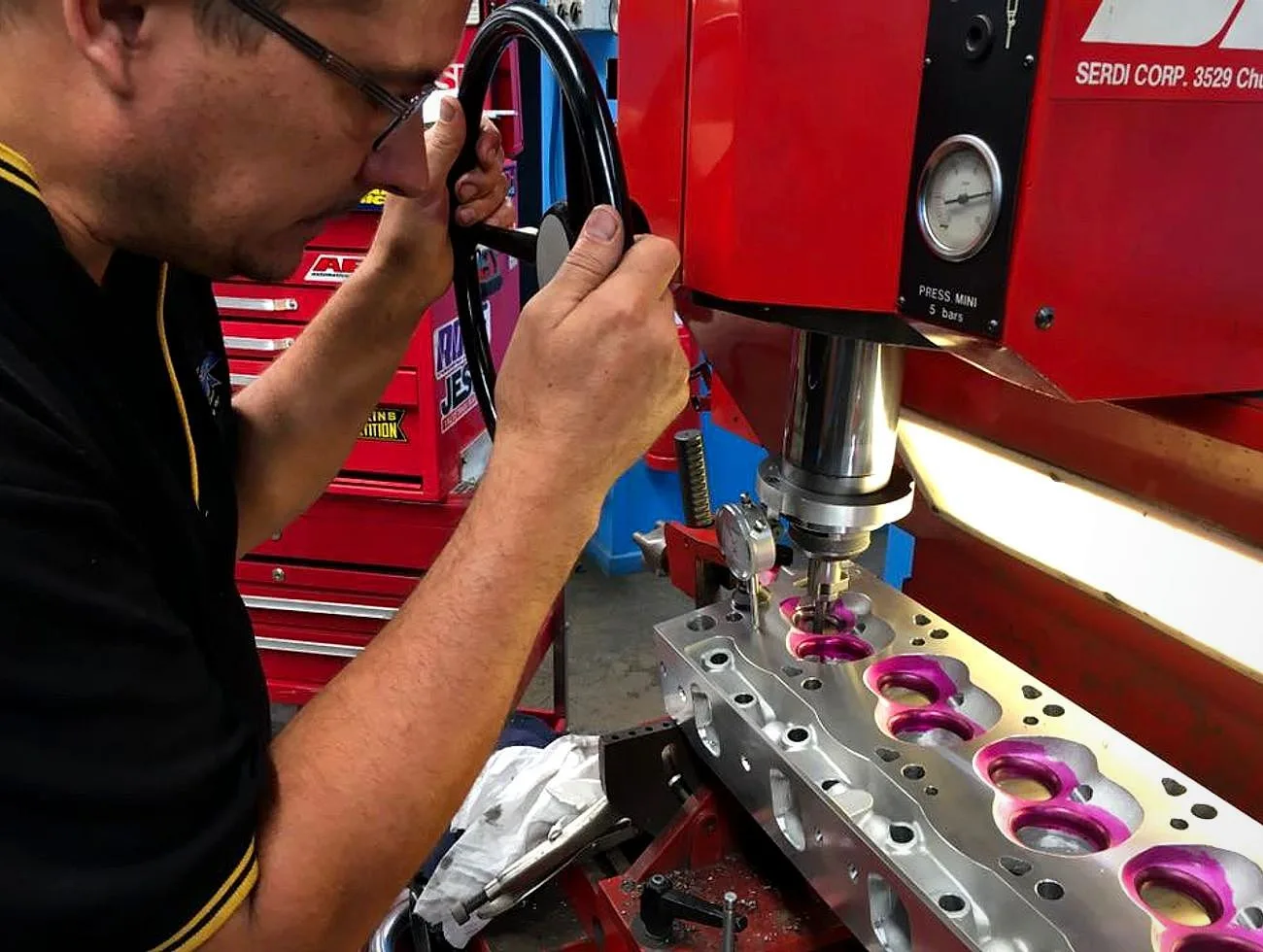 Cylinder head machining on the SERDI seat machine at THR Developments