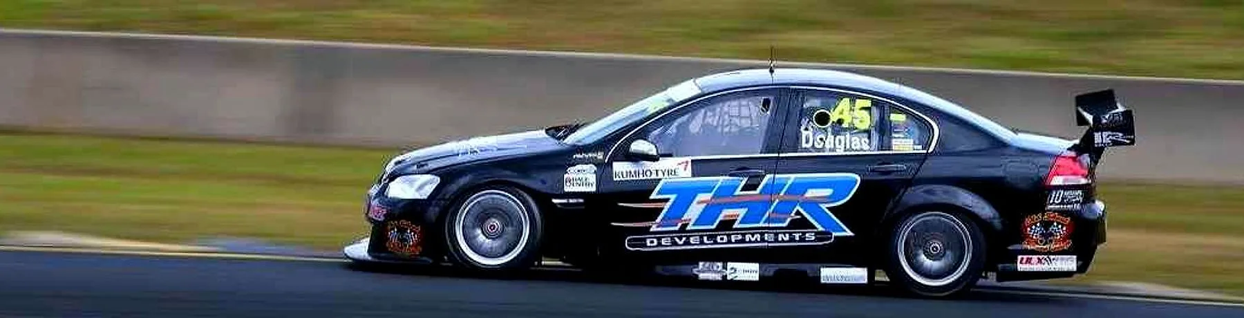 THR Developments number 45 race car in full livery at speed